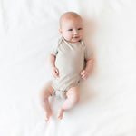 Load image into Gallery viewer, Kyte Baby Oat Bodysuit