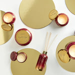 Load image into Gallery viewer, Capri Blue Tinsel & Spice Glimmer Mini Tin Candle 3oz