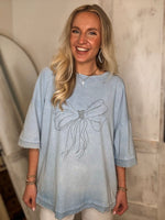 Load image into Gallery viewer, Tied Down Blue Graphic Bow S/S Tee
