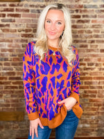 Load image into Gallery viewer, End It Right Rust &amp; Royal Blue Animal Print Sweater
