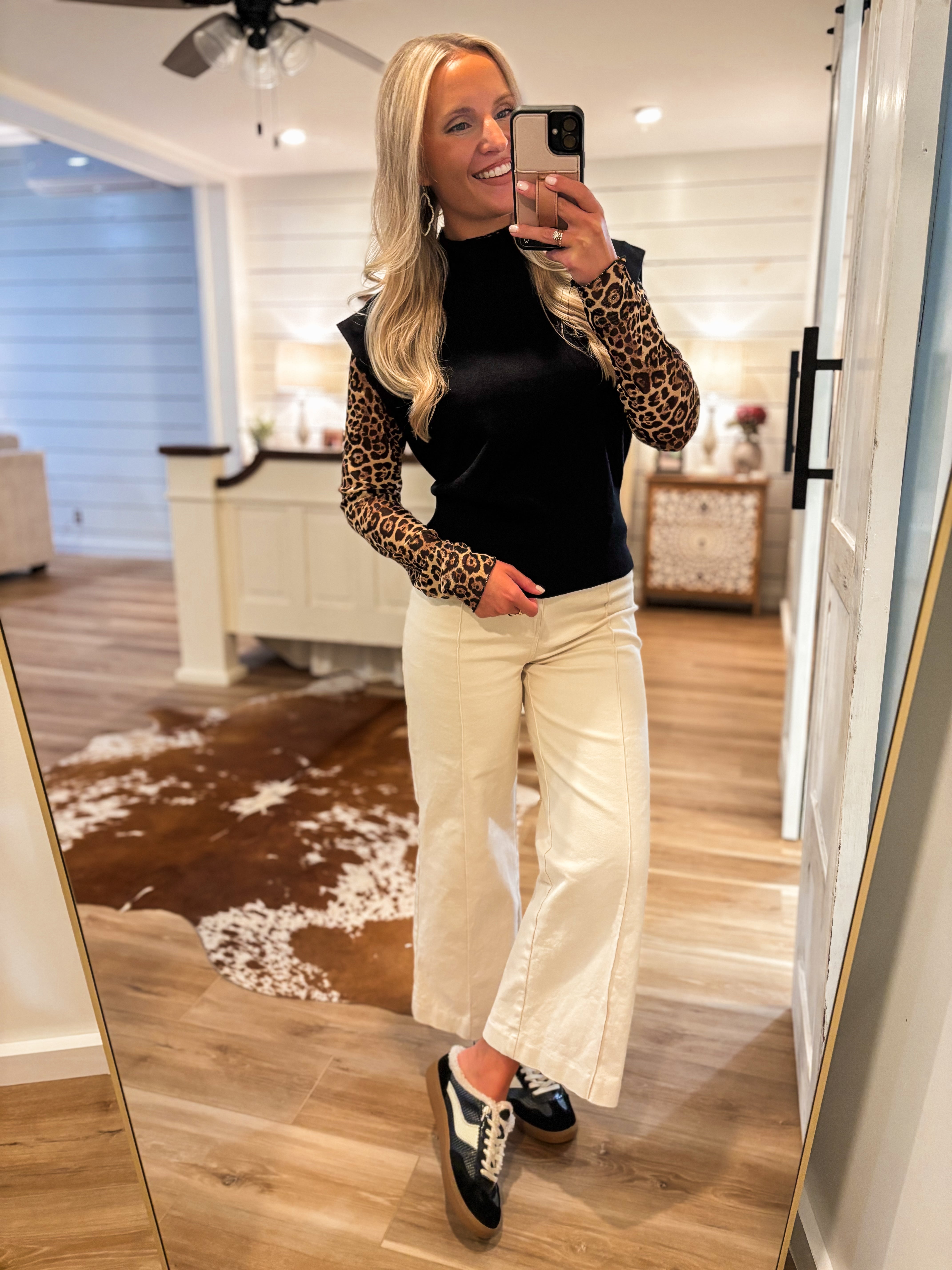 In Charge Black Sleeveless Sweater Blouse