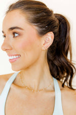 Load image into Gallery viewer, Huggie Earrings - Scarlett Hoop Gold 8mm CZ
