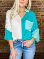 Load image into Gallery viewer, Settling Up White &amp; Aqua Two-Toned Pocket Blouse
